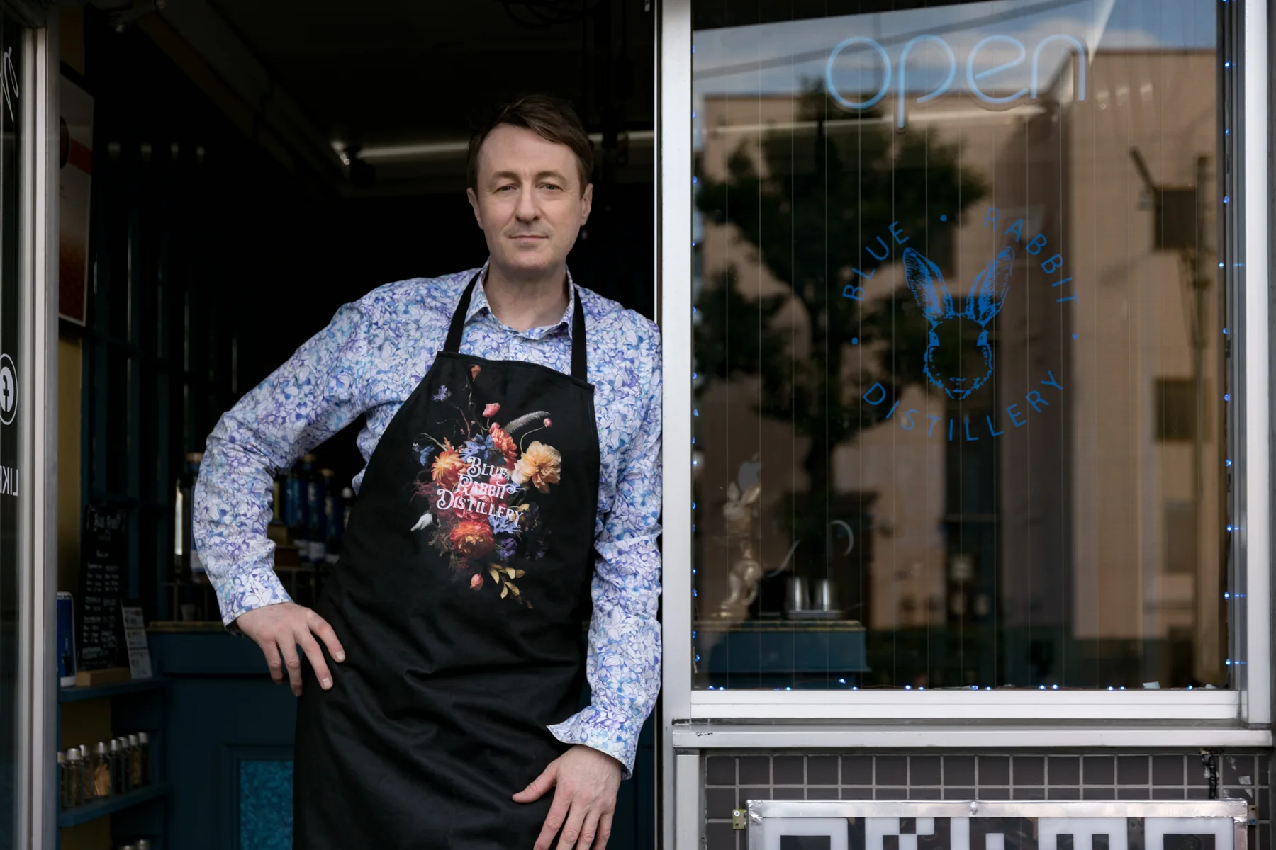 Mark Smyth standing outside Blue Rabbit Distillery in Tokyo.